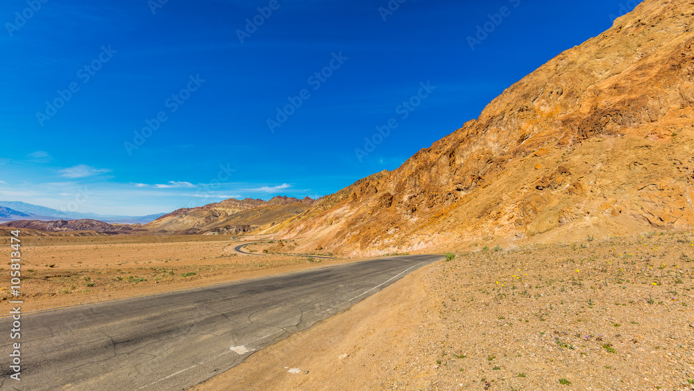 Artist drive turns into a narrow and winding road. The one-way road is great and offers majestic views. It contains colorful rock formations. Artist's Drive, Death Valley National Park
