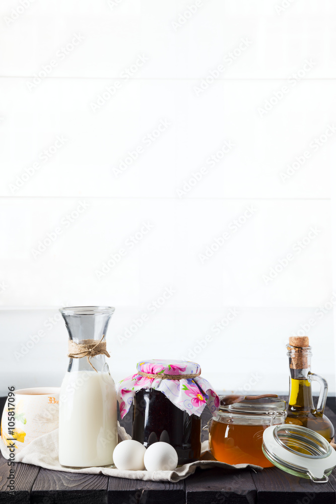 ingredients for breakfast on a wooden table with free white space ingredients for breakfast on a wooden table with free white space