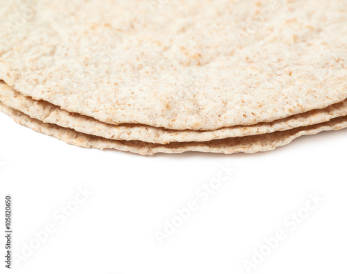 Pile of wheat tortillas isolated