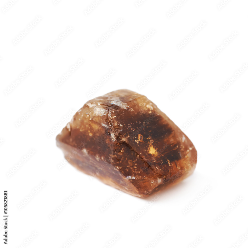 Single rock sugar crystal isolated Single rock sugar crystal isolated