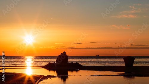 couple watching a romantic sunset © zakaz86