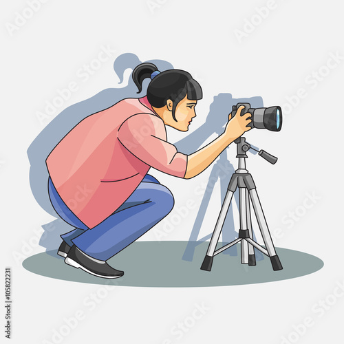 Young female photographer photographing 