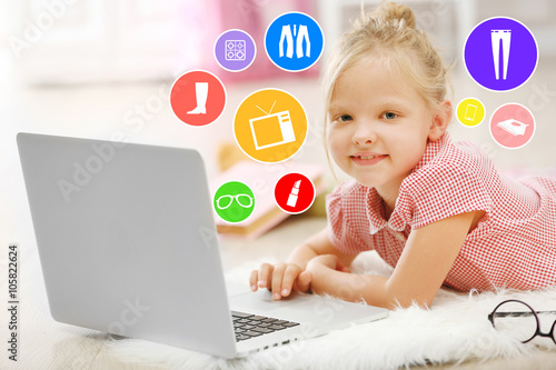 Online shopping. Little gir...