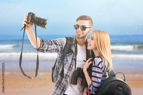 Young couple of travelers t...