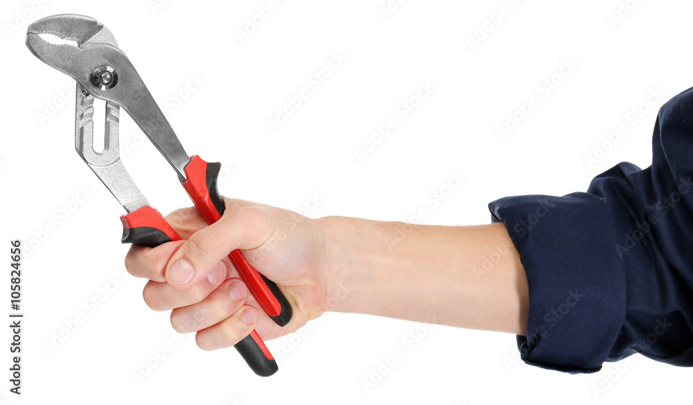 A hand of repairman holding pliers, on white background, close-up A hand of repairman holding pliers, on white background, close-up