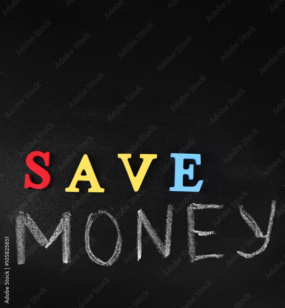 Save money concept on a blackboard background Save money concept on a blackboard background