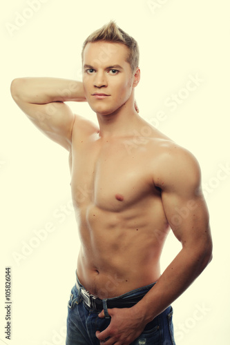 Healthy muscular young man. 