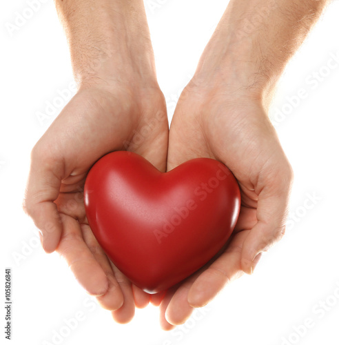 Decorative heart in male hands, isolated on white