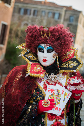 Venice - February 6, 2016: Colourful carnival mask through the streets of Venice and in St. Mark's Square during celebration of the most famous carnival in the world.