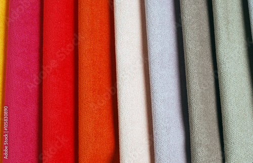 Bright collection of colorful velour textile samples. Fabric texture background photo