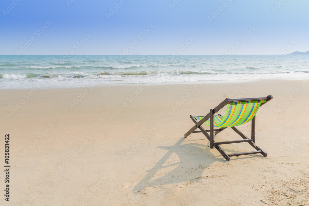 Beach chair on the sand ( feel lonely concept) Beach chair on the sand ( feel lonely concept)