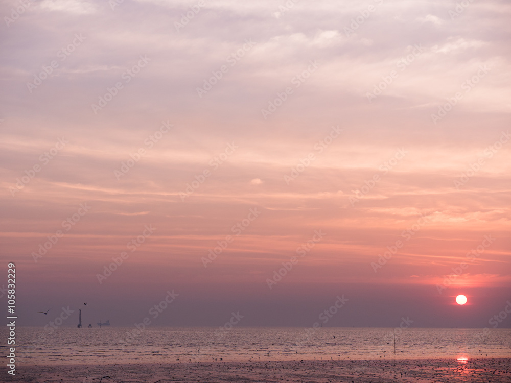 Ship in the sea at sunset Ship in the sea at sunset