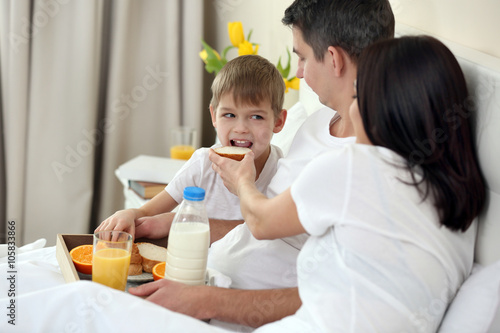 Family having breakfast wit...