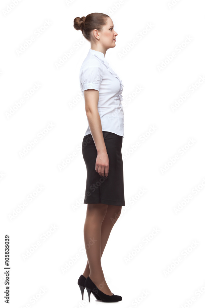 Profile of young woman in full growth on white background Profile of young woman in full growth on white background