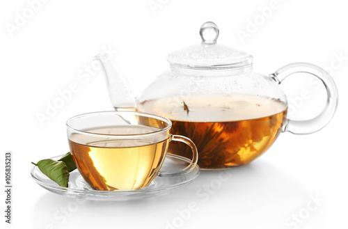 Cup of tea and teapot isolated on white