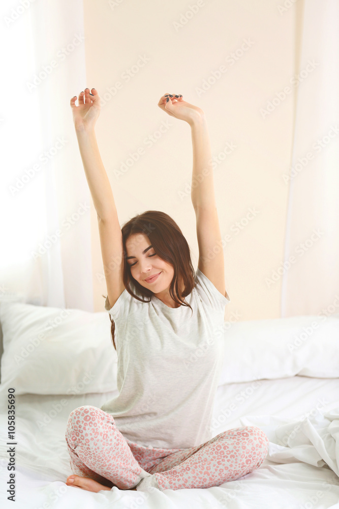 Beautiful young girl waking up after a night sleep. Beautiful young girl waking up after a night sleep.