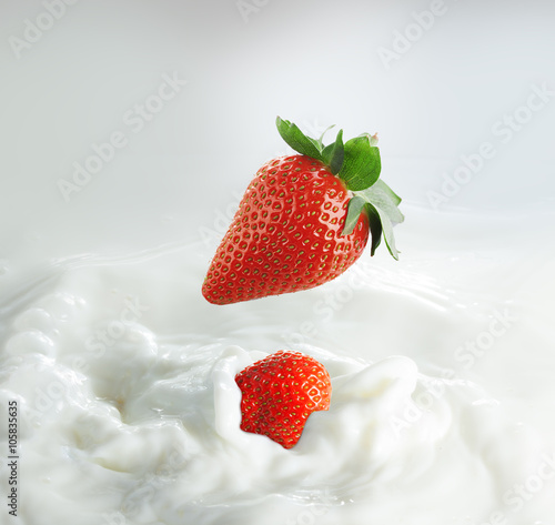 strawberries in milk splash