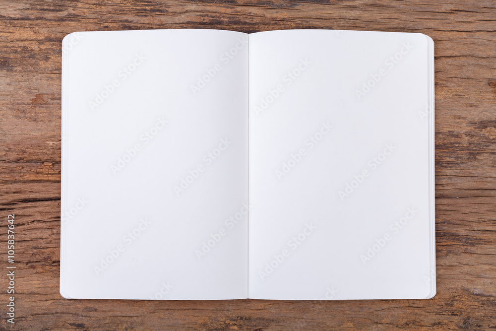 Blank empty notepad on wood background Blank empty notepad on wood background