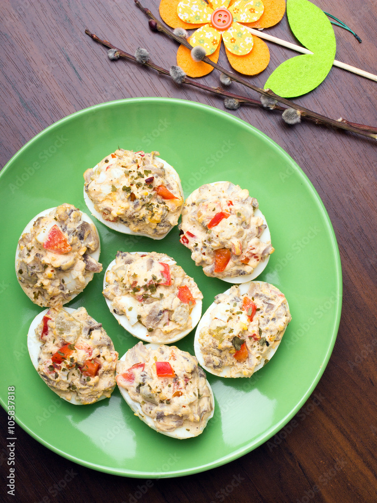stuffed eggs with peppers, mushrooms and herbs - selective focus stuffed eggs with peppers, mushrooms and herbs - selective focus