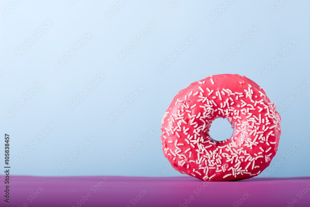 Donut with pink icing Donut with pink icing