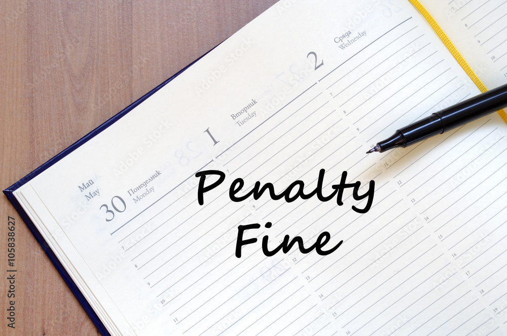 Penalty fine write on notebook Penalty fine write on notebook