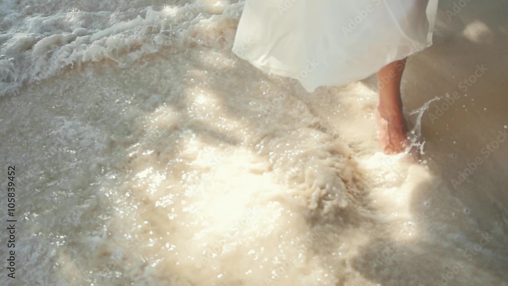 Nice Legs of a Pretty Girl Walking in Water on Beach Exotic Islands Nice Legs of a Pretty Girl Walking in Water on Beach Exotic Islands