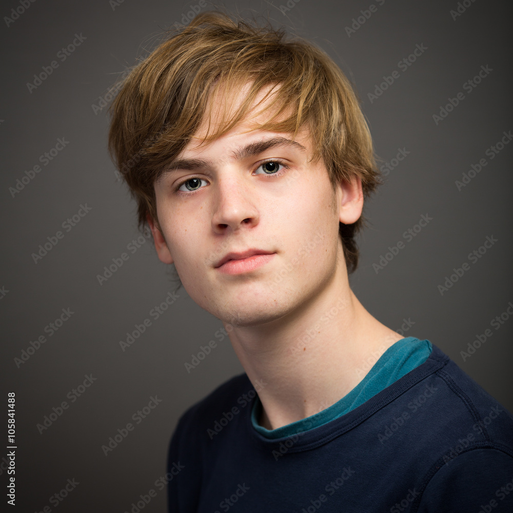 Confident Teenage Blond Young Man In The Studio Confident Teenage Blond Young Man In The Studio