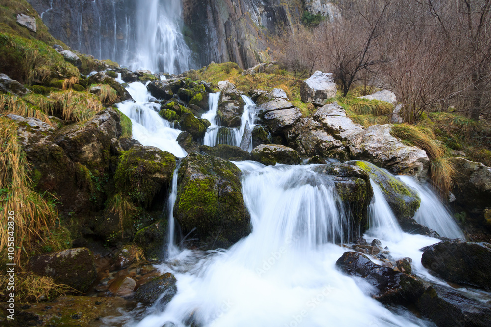 Fototapeta premium Waterfall in the birth of the river Ason, Cantabria, Spain