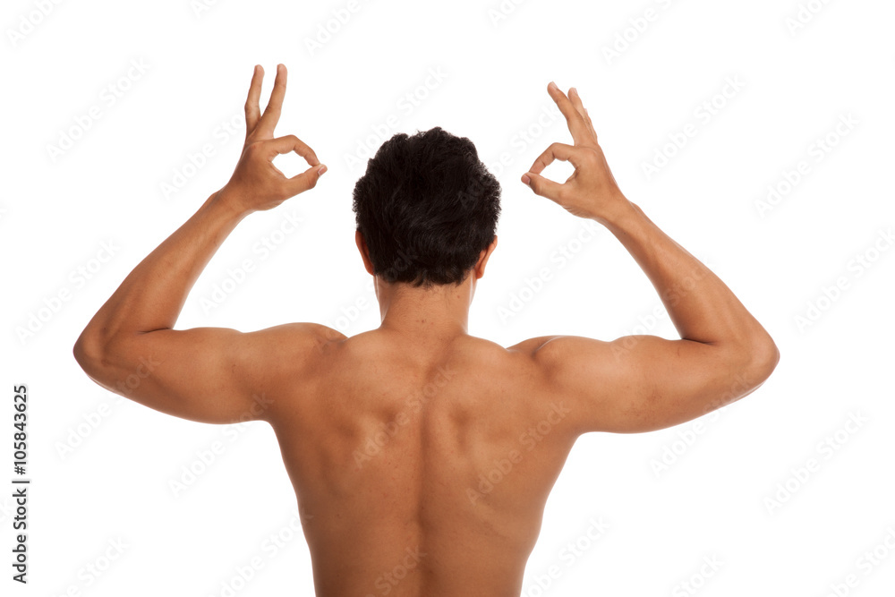 Back of muscular Asian man flexing biceps show OK sign Back of muscular Asian man flexing biceps show OK sign