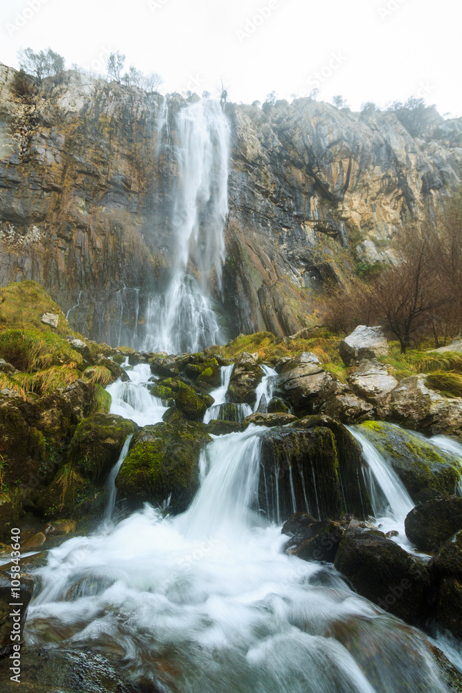 Obraz premium Waterfall in the birth of the river Ason, Cantabria, Spain