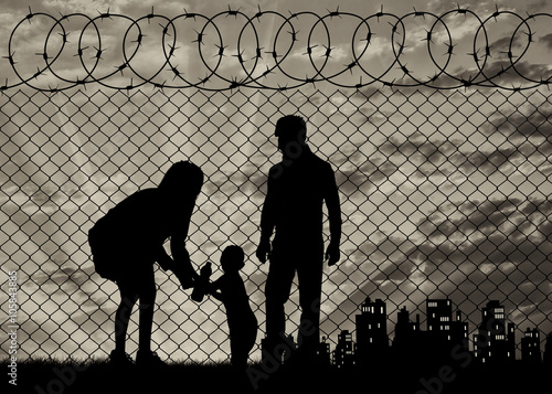 Silhouette of refugee families