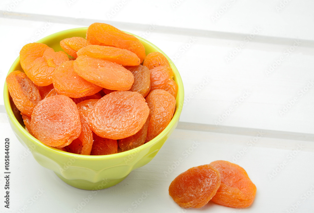 Bowl with dried apricots Bowl with dried apricots