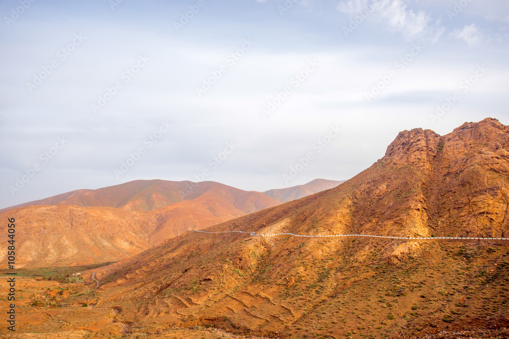 Mountain landscape at the central part of Fuerteventura island on the cloudy and foggy weather in Spain