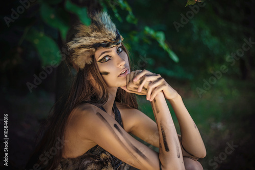 Portrait of a beautiful brown-eyed Amazon in furs