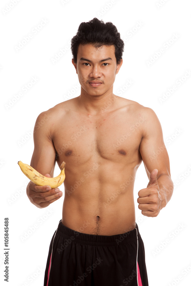 Fototapeta premium Muscular Asian man with banana