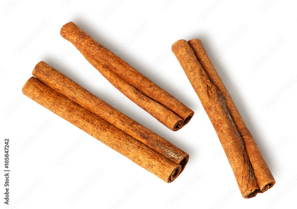 Three cinnamon sticks lie nearby Three cinnamon sticks lie nearby