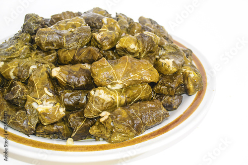 rice wrapped in grape leaves - green vine leaves with rice - greek food photo