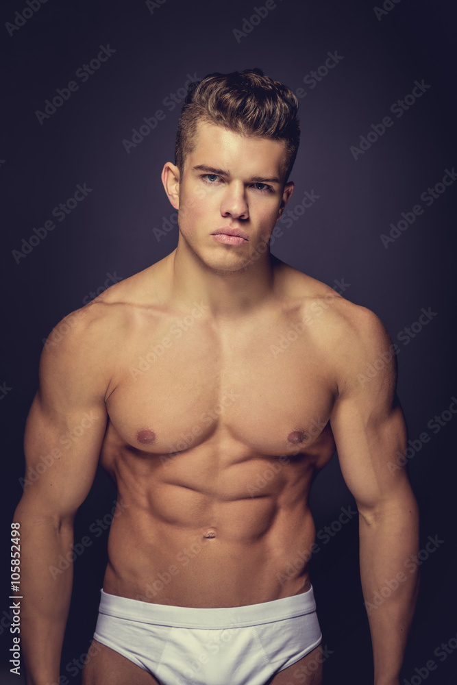 Attractive shirtless muscular guy. Attractive shirtless muscular guy.