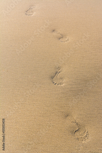 Footmarks on the golden sandy beach