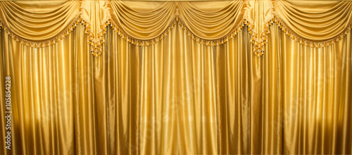 luxury yellow Gold curtains texture background on theatre cinema stage wallpaper 