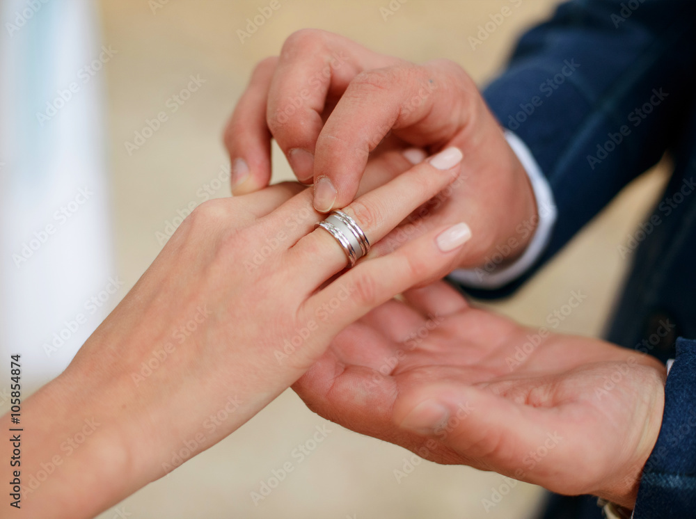 Man making proposal with the ring to his girlfriend. Put ring on hand. Man making proposal with the ring to his girlfriend. Put ring on hand.