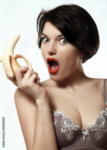 Sexy girl with a banana. Underwear. Makeup. Emotions. Stock Photo | Adobe  Stock