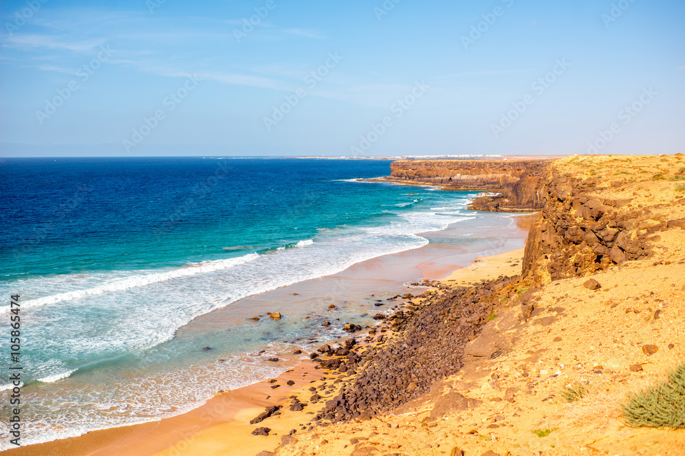 Sandy rocky coastline on the north western part of Fuerteventura island near El Cotillo village
