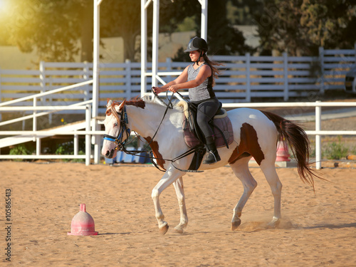 girl is riding a horse