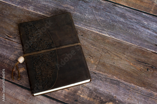 Classic Leather Bound Journal Book on a Old Barn Board Floor