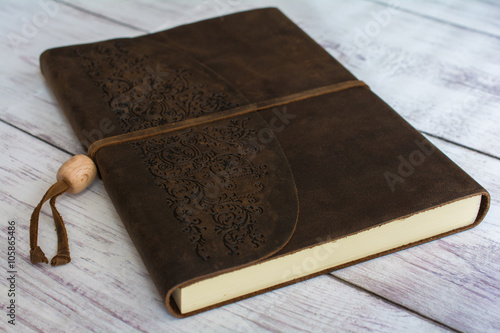 Photography Classic Leather Bound Journal Book on a White Barn Board Floor Close Up