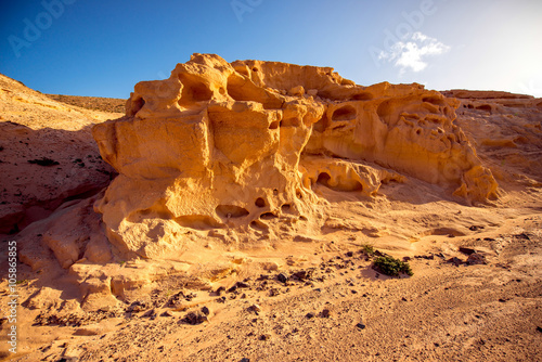 Natural dried riverbed with beautiful solid sand shapes on Fuerteventura island in Spain 