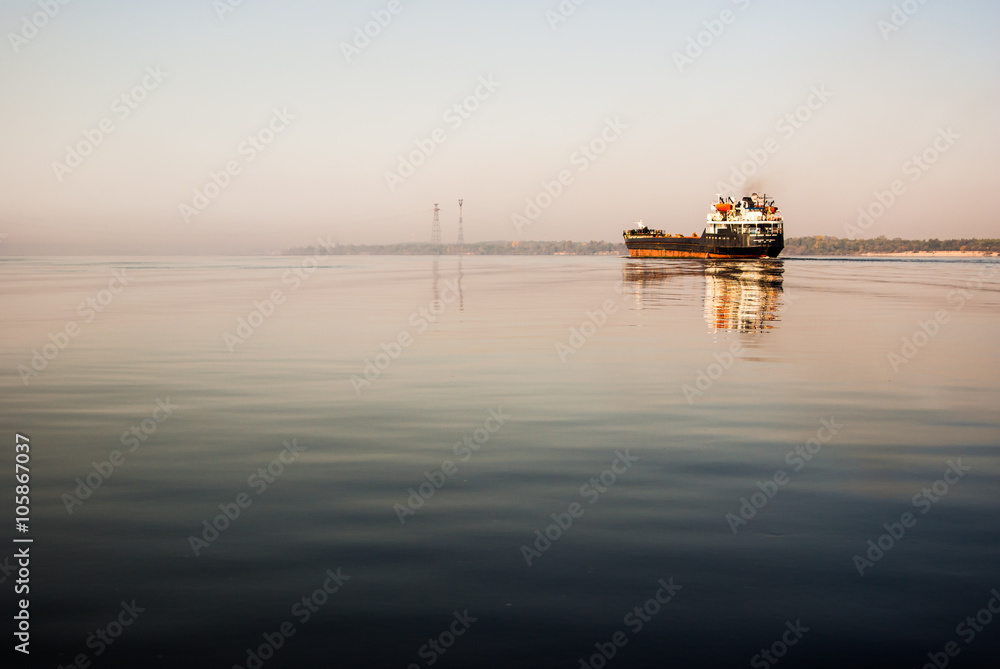 cargo ship floats on the river Volga cargo ship floats on the river Volga