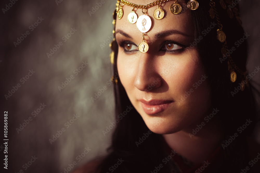 Attractive woman with indian indian tikka. Traditional indian jewellery