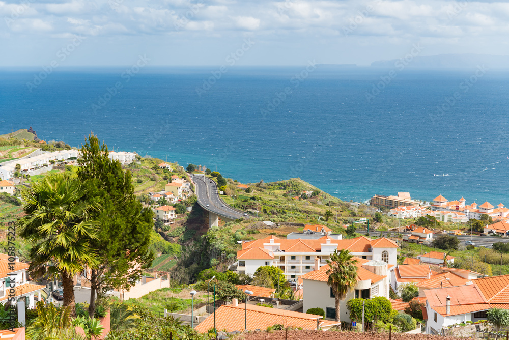 View down valley in Madeira Portugal with ocean in background